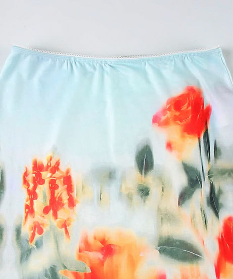 Effortless Chic: Watercolor Floral Mini Skirt with Stylish Striped Hem – Your Fall Transition Essential