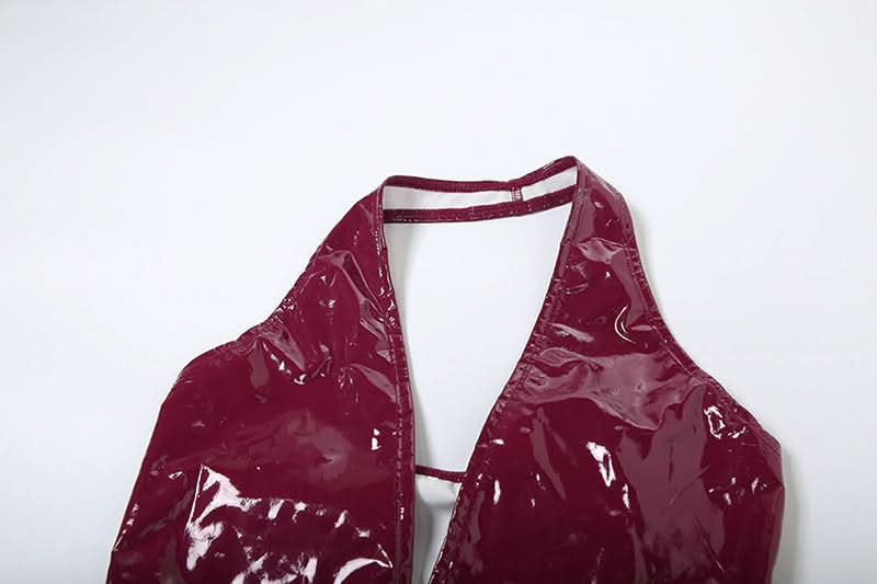 Unleash Your Inner Vixen: Sleek Burgundy Faux Leather Halter Jumpsuit for Fall & Halloween Glam