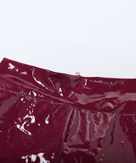 Unleash Your Inner Vixen: Sleek Burgundy Faux Leather Halter Jumpsuit for Fall & Halloween Glam