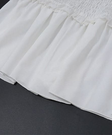Effortless White Smocked Ruffle Mini Dress | Your Perfect Fall Getaway & Resort Vacation Style