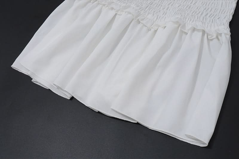 Effortless White Smocked Ruffle Mini Dress | Your Perfect Fall Getaway & Resort Vacation Style