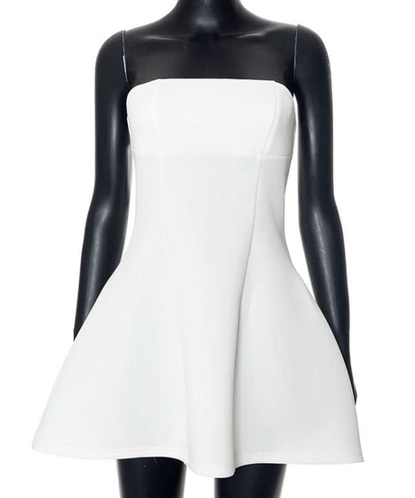 The Flattering Little White Dress: Chic Strapless Mini for Holiday Parties & Resort Escapes