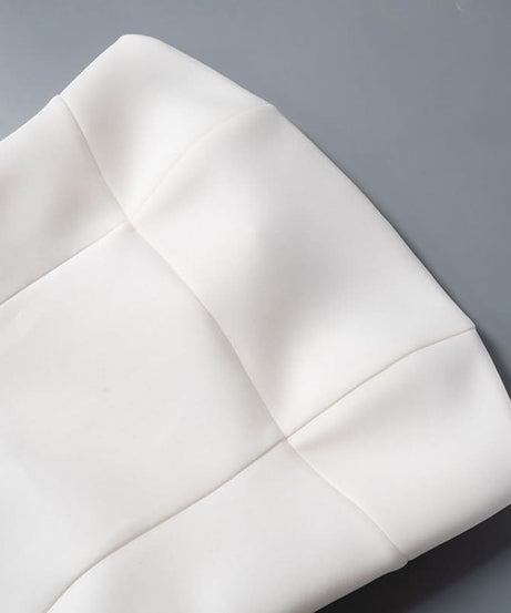 The Flattering Little White Dress: Chic Strapless Mini for Holiday Parties & Resort Escapes