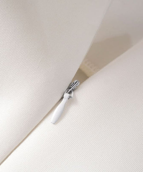 The Flattering Little White Dress: Chic Strapless Mini for Holiday Parties & Resort Escapes