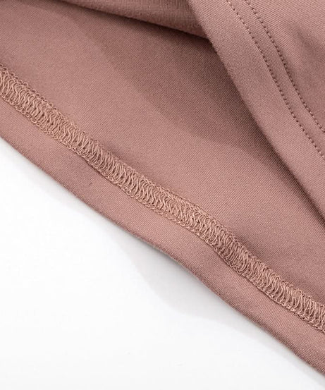 Sculpted Chic: Dusty Rose Effortless Sleeveless Top for Fall Layering