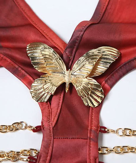 Fall Femme Fatale: Red Halter Cutout Maxi Dress with Gold Chain & Butterfly Detail