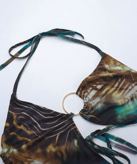 Destination Diva: O-Ring Halter Cut-Out Maxi Dress - Abstract Swirl Print for Resort Glam & Tropical Escapes