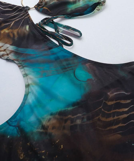 Destination Diva: O-Ring Halter Cut-Out Maxi Dress - Abstract Swirl Print for Resort Glam & Tropical Escapes