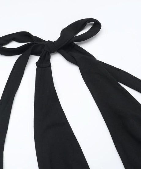 Sultry Black Halter Cutout Flare Jumpsuit - Edgy Deep V & Bell Bottoms for Fall Nights