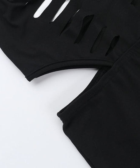 Sultry Black Halter Cutout Flare Jumpsuit - Edgy Deep V & Bell Bottoms for Fall Nights