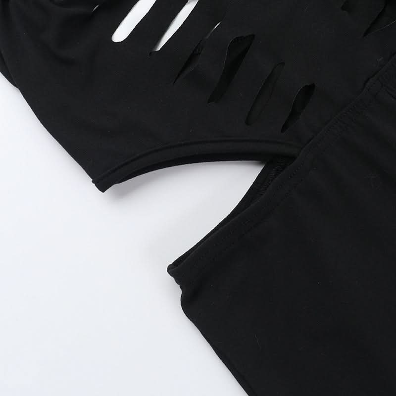 Sultry Black Halter Cutout Flare Jumpsuit - Edgy Deep V & Bell Bottoms for Fall Nights