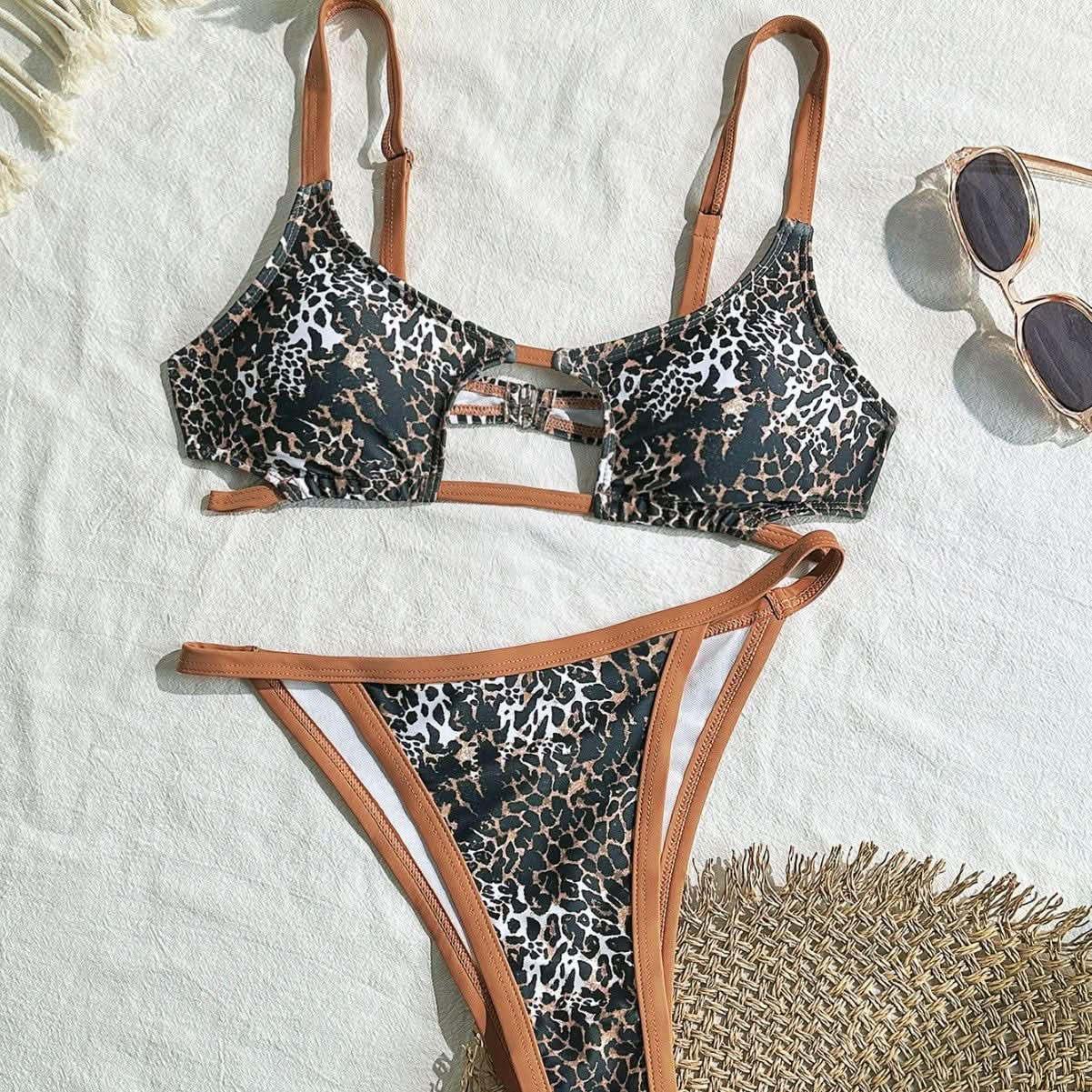 Wildly Chic: Leopard Print Cutout High-Leg Bikini Set – Perfect for Your Resort & Vacation Escape
