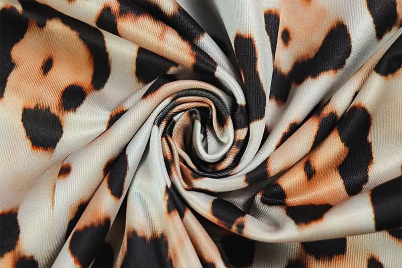 Fierce Leopard Print Cami Jumpsuit: Unleash Your Inner Wild for Fall Nights & Beyond!