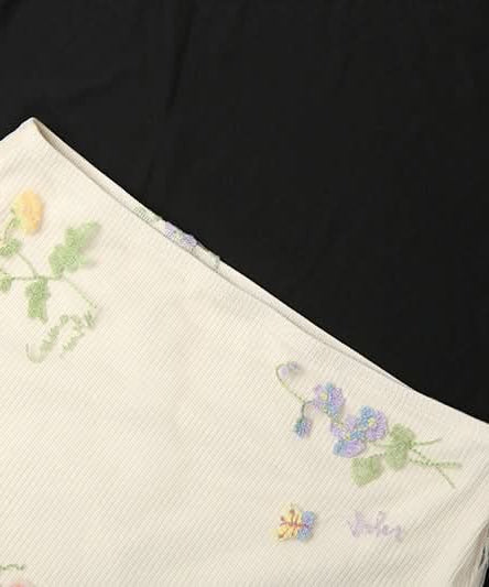 Whimsical Floral Embroidered Ribbed Mini Skirt with Sheer Ruffle Trim