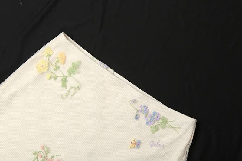 Whimsical Floral Embroidered Ribbed Mini Skirt with Sheer Ruffle Trim