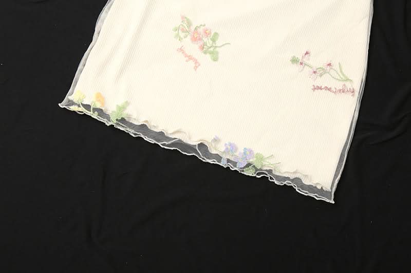 Whimsical Floral Embroidered Ribbed Mini Skirt with Sheer Ruffle Trim