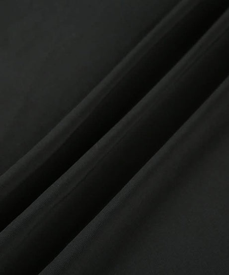 Effortless Elegance: Black Halter High-Low Dress with Sculpted Buckle – Fall & Holiday Ready