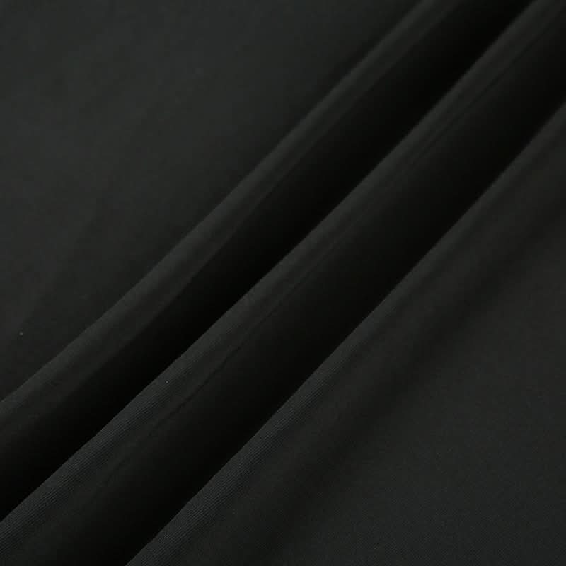 Effortless Elegance: Black Halter High-Low Dress with Sculpted Buckle – Fall & Holiday Ready