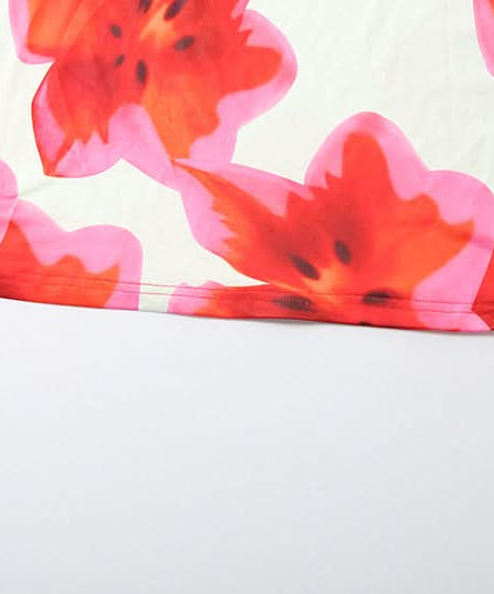 Vibrant Bloom Halter Cut-Out Maxi Dress - Your Go-To for Holiday Getaways & Resort Chic