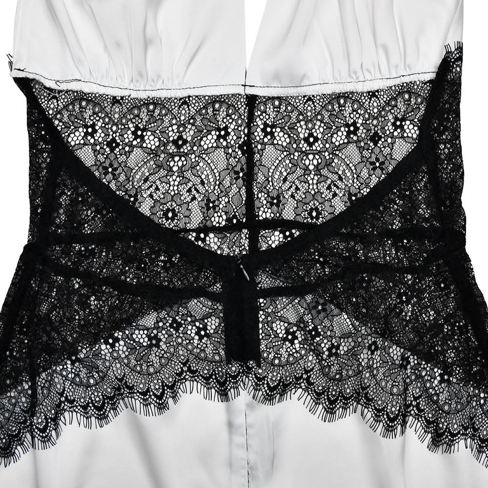 Chic White Halter Maxi Dress with Alluring Black Lace Detail - Your Holiday & NYE Glamour Statement