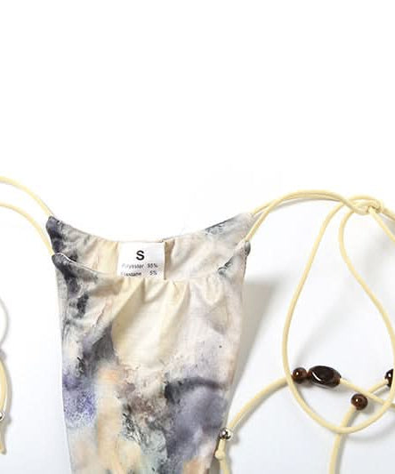 Escape the Chill: Trendy Abstract Halter Bikini & Sheer Lace-Up Sarong 3-Piece Set - Your Ultimate Resort & Cruise Ready Look