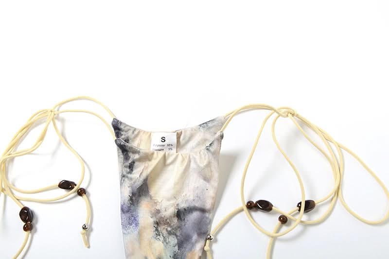 Escape the Chill: Trendy Abstract Halter Bikini & Sheer Lace-Up Sarong 3-Piece Set - Your Ultimate Resort & Cruise Ready Look