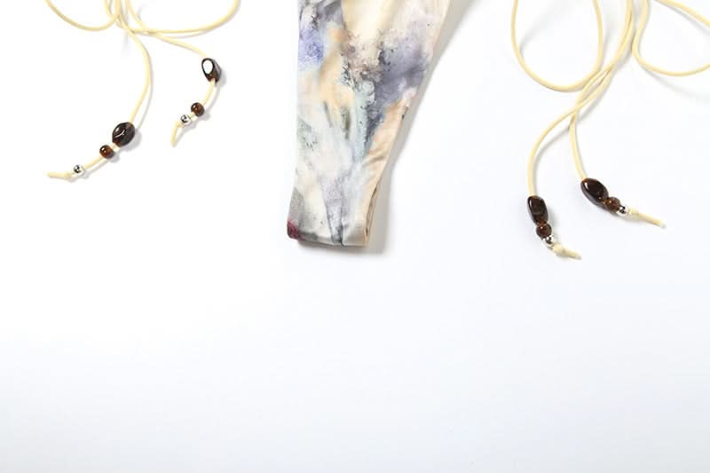 Escape the Chill: Trendy Abstract Halter Bikini & Sheer Lace-Up Sarong 3-Piece Set - Your Ultimate Resort & Cruise Ready Look