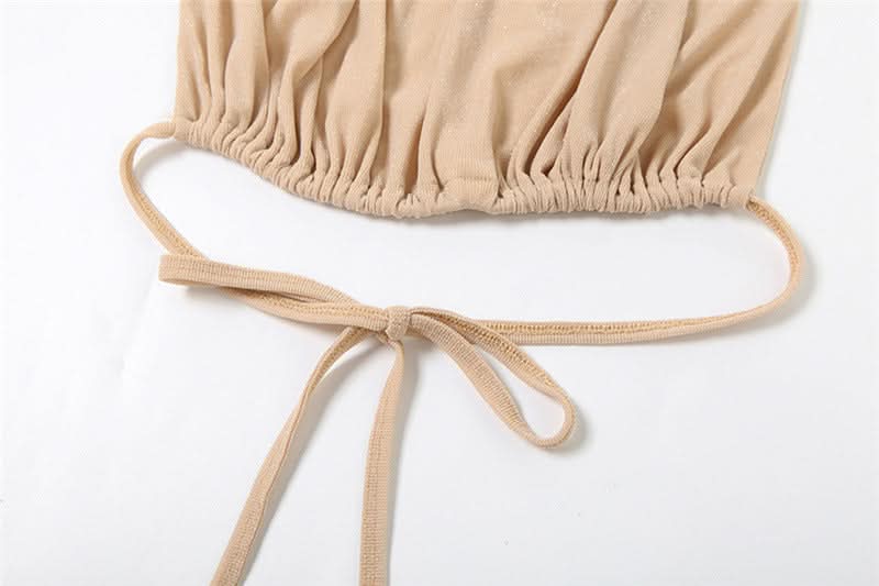 Holiday Escape: Chic Nude Halter Ruched Crop Top & Sheer Maxi Skirt Set