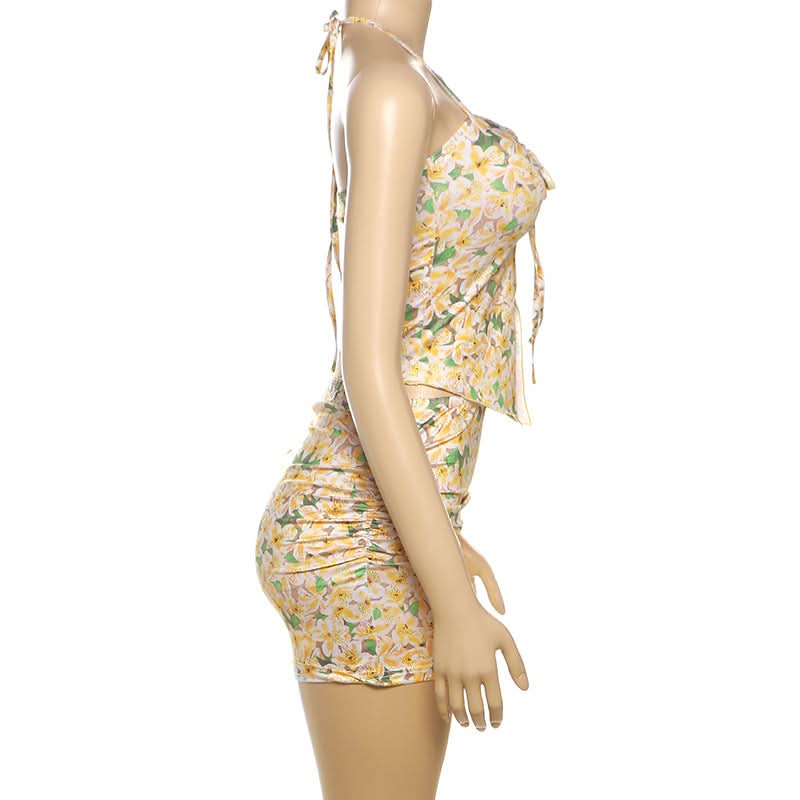 Effortless Chic: Vibrant Floral Halter & Ruched Mini Skirt Set - Your Perfect Getaway Outfit