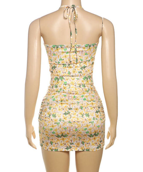 Effortless Chic: Vibrant Floral Halter & Ruched Mini Skirt Set - Your Perfect Getaway Outfit