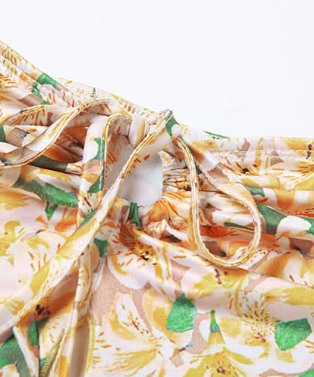 Effortless Chic: Vibrant Floral Halter & Ruched Mini Skirt Set - Your Perfect Getaway Outfit