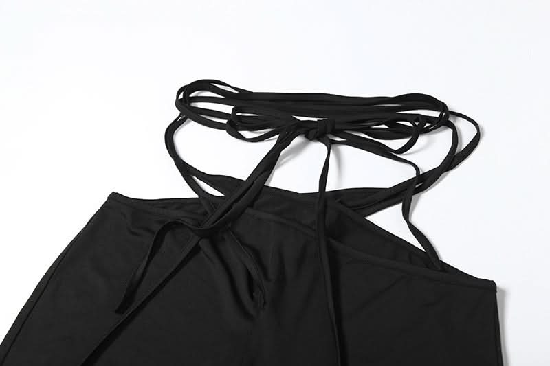 Edgy Black Cut-Out Two-Piece Set: Strappy Crop Top & Self-Tie Leggings for Fall Nights