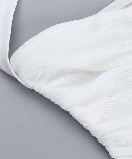 Elegant White Halter Peplum Top with Gold Seashell Accent - Your Perfect Resort & Vacation Essential