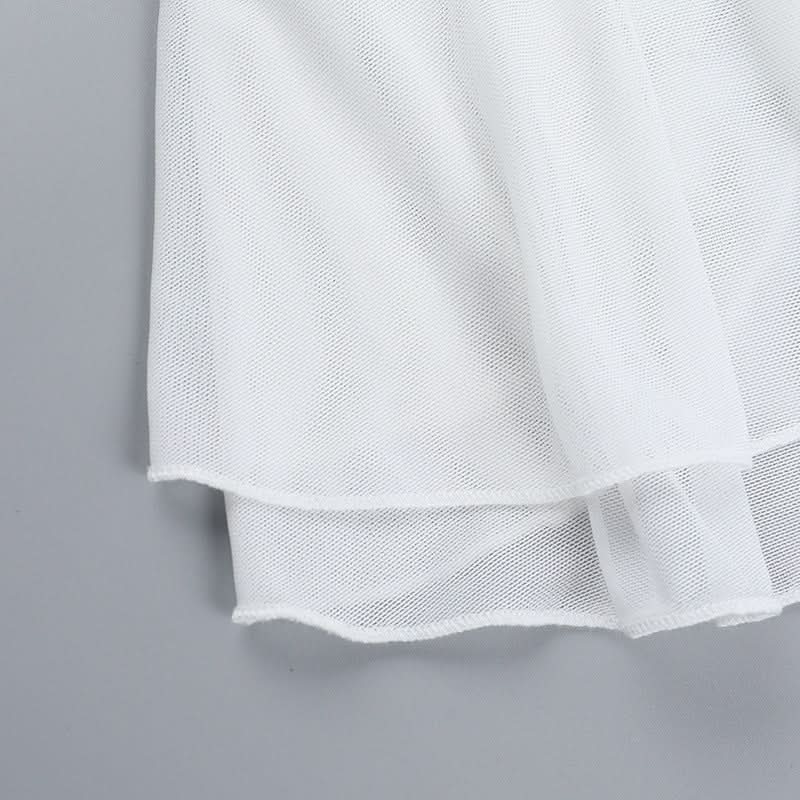 Elegant White Halter Peplum Top with Gold Seashell Accent - Your Perfect Resort & Vacation Essential