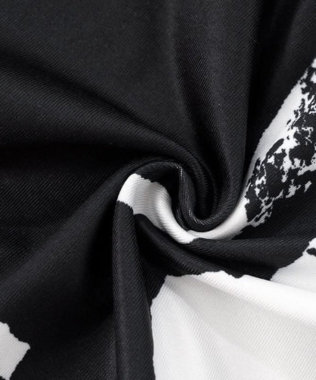 Holiday Glamour: Black & White Abstract Print Keyhole Maxi Dress