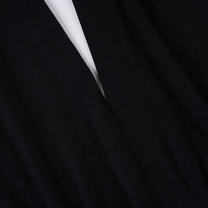 Effortless Fall Chic: Black Halter V-Neck Top with Backless Design & Button Detail