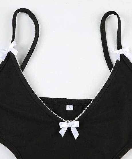 Coquette Chic: Black Bow-Detail Cutout Bodysuit - Fall's Must-Have Statement Piece