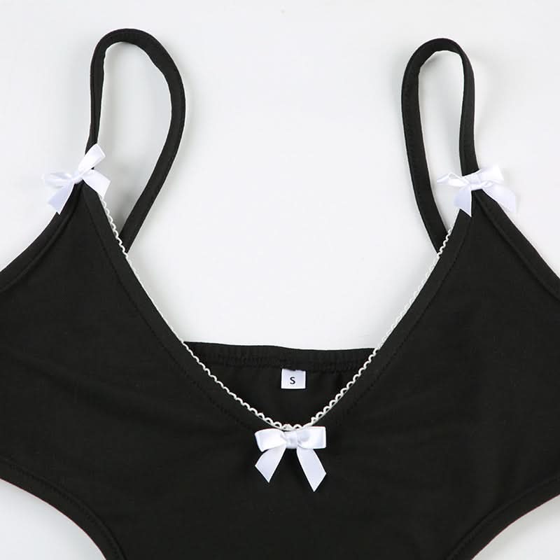 Coquette Chic: Black Bow-Detail Cutout Bodysuit - Fall's Must-Have Statement Piece