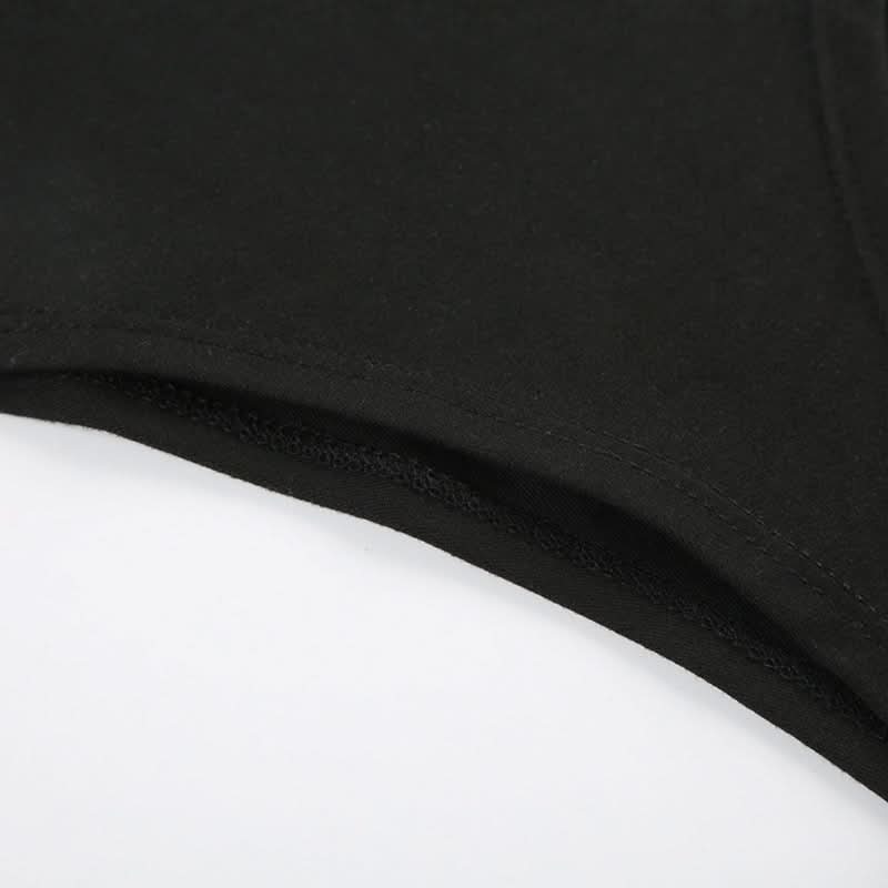 Coquette Chic: Black Bow-Detail Cutout Bodysuit - Fall's Must-Have Statement Piece