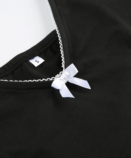 Coquette Chic: Black Bow-Detail Cutout Bodysuit - Fall's Must-Have Statement Piece