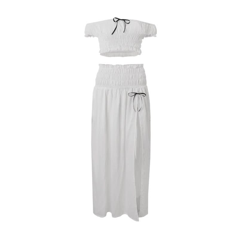 Effortless Resort Chic: White Smocked Off-Shoulder Crop Top & Slit Maxi Skirt Set with Bow Details | Your Winter Getaway Essential