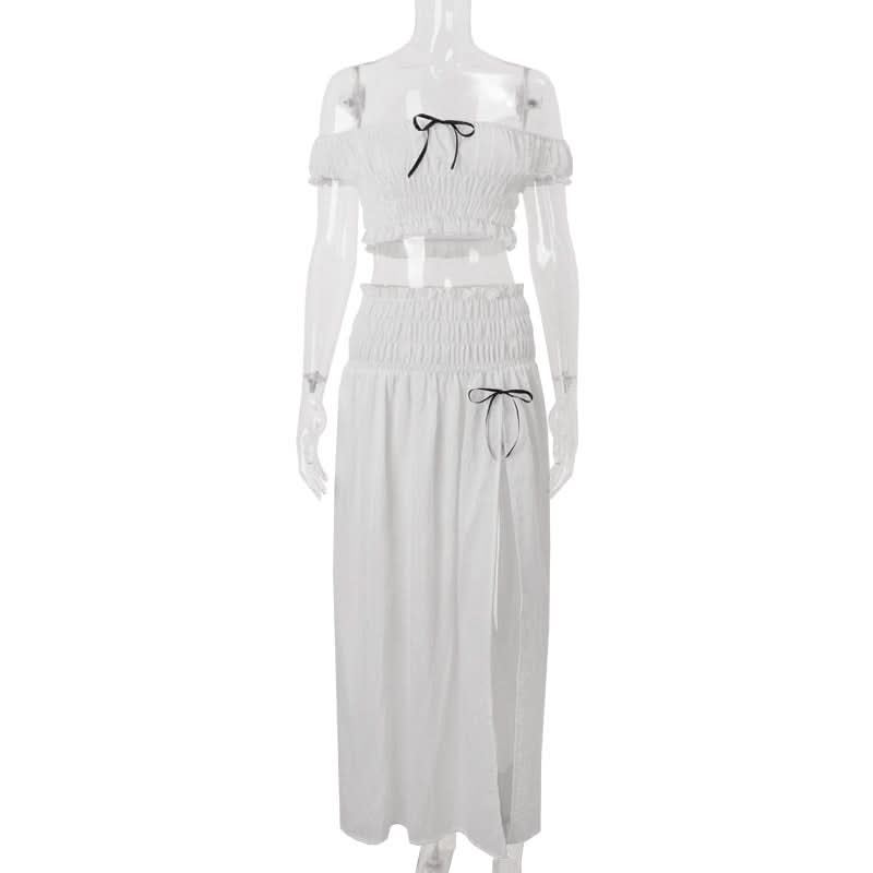 Effortless Resort Chic: White Smocked Off-Shoulder Crop Top & Slit Maxi Skirt Set with Bow Details | Your Winter Getaway Essential