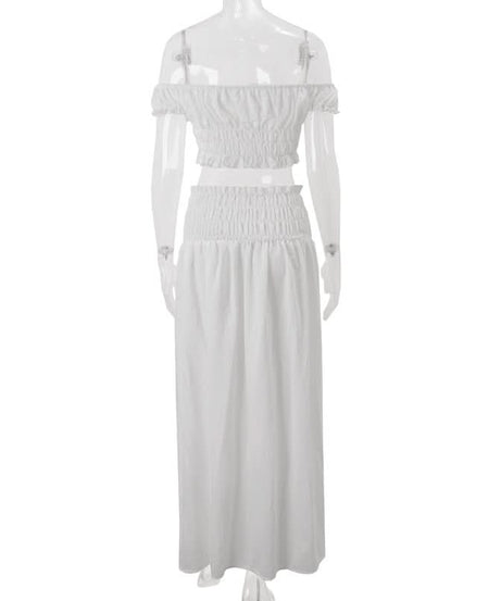Effortless Resort Chic: White Smocked Off-Shoulder Crop Top & Slit Maxi Skirt Set with Bow Details | Your Winter Getaway Essential