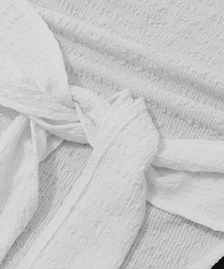 Effortless White Textured Halter Neck Tie-Hem Top - Your Chic Resort & Fall Getaway Essential