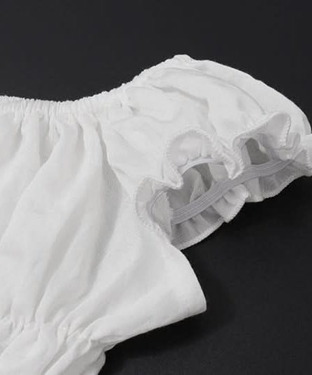 Effortless Resort Chic: White Smocked Off-Shoulder Crop Top & Slit Maxi Skirt Set with Bow Details | Your Winter Getaway Essential