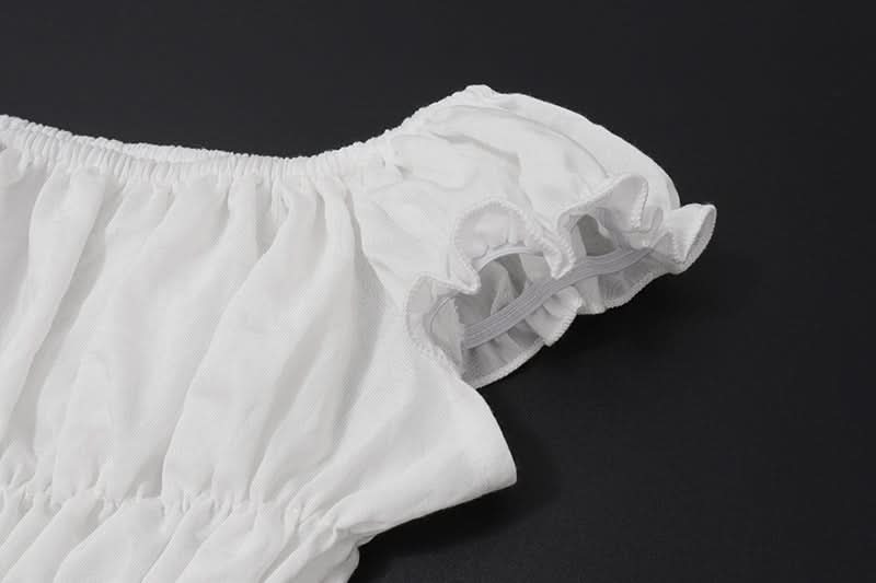 Effortless Resort Chic: White Smocked Off-Shoulder Crop Top & Slit Maxi Skirt Set with Bow Details | Your Winter Getaway Essential