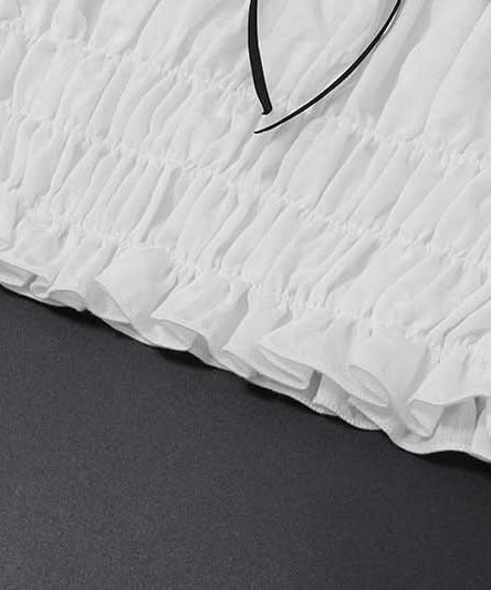 Effortless Resort Chic: White Smocked Off-Shoulder Crop Top & Slit Maxi Skirt Set with Bow Details | Your Winter Getaway Essential