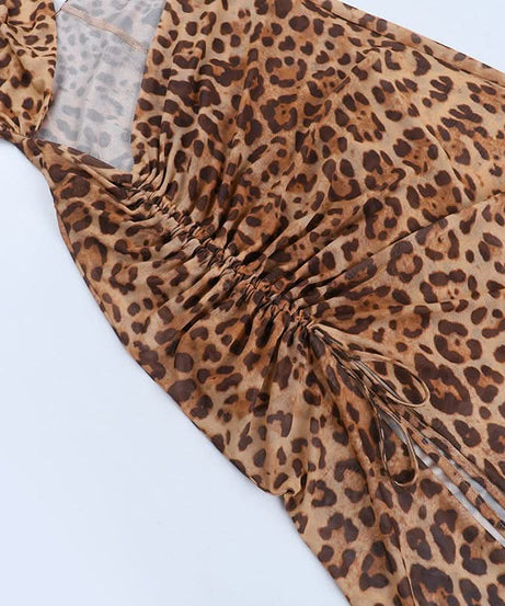 Unleash Your Wild Side: Daring Leopard Print Halter Cut-Out Maxi Dress - Perfect for Fall Parties & Holiday Getaways