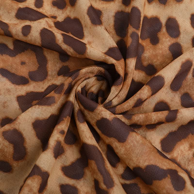 Unleash Your Wild Side: Daring Leopard Print Halter Cut-Out Maxi Dress - Perfect for Fall Parties & Holiday Getaways