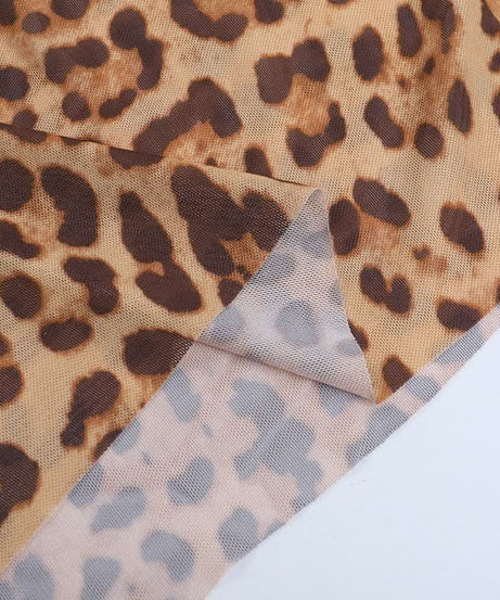 Unleash Your Wild Side: Daring Leopard Print Halter Cut-Out Maxi Dress - Perfect for Fall Parties & Holiday Getaways